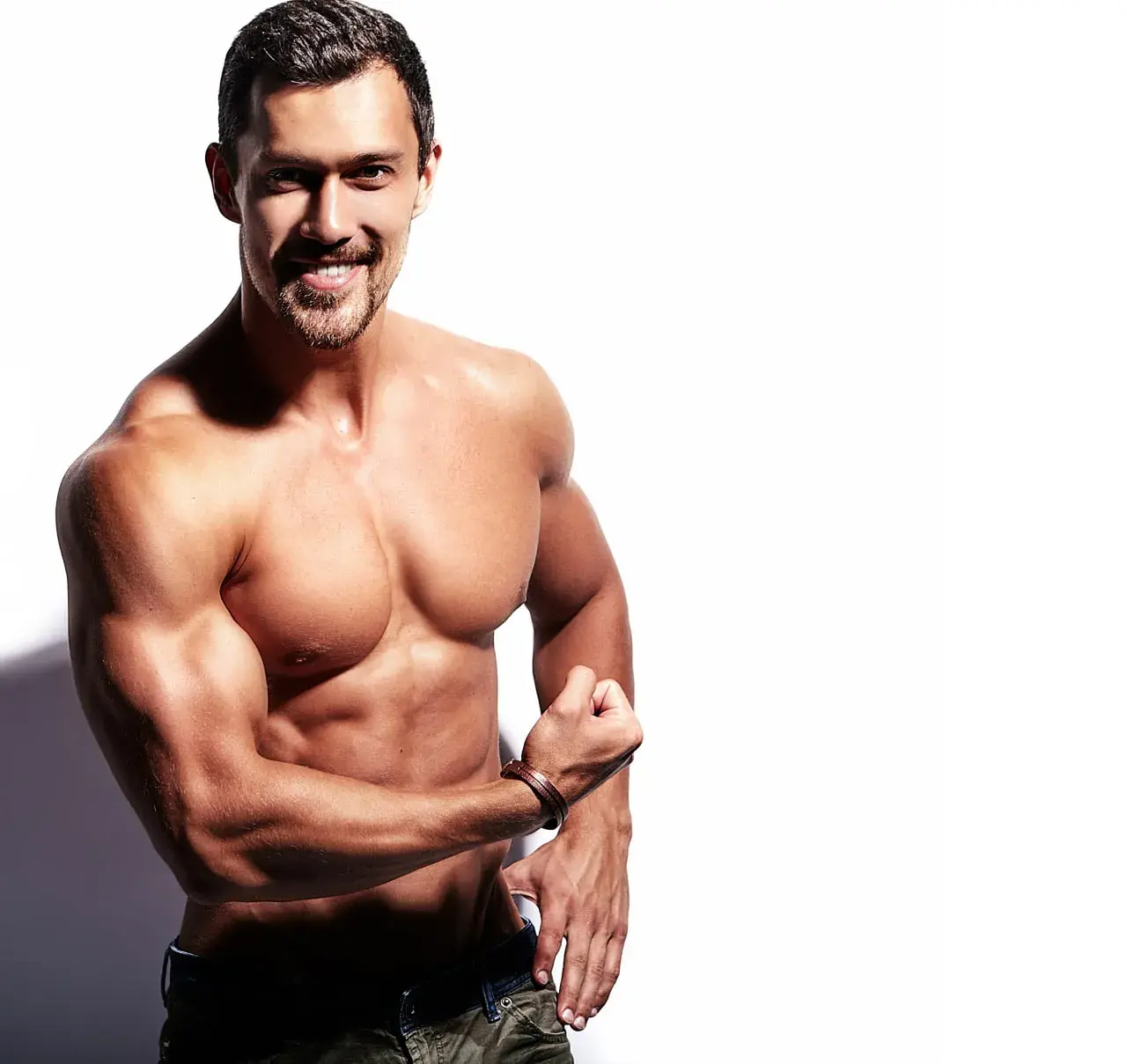 Fit man showing the strength and muscle gains from testosterone replacement therapy in Houston