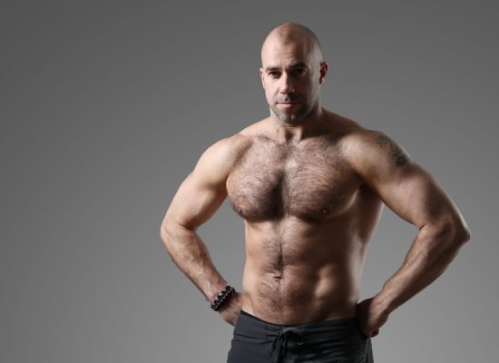 Bodybuilder. Man with muscular body