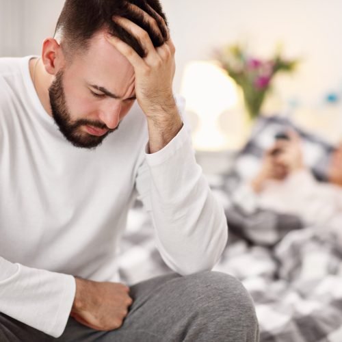 Picture showing adult attractive couple in bed