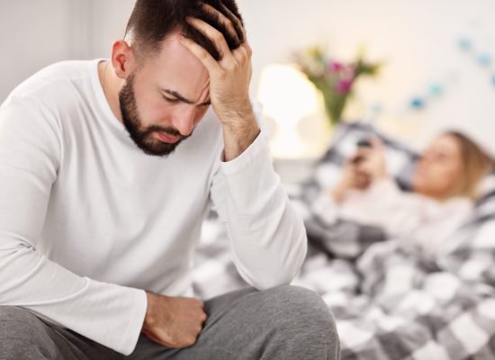 Picture showing adult attractive couple in bed